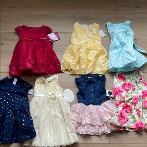 NWT bundle of Girls 2T and 24 mos Dresses new with tags!